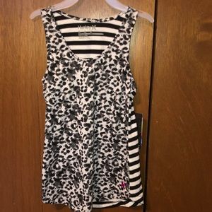 BRAND NEW GIRLS TANK TOP SIZE MEDIUM. NEW WITH TAGS ON IT. SMOKE FREE HOME.